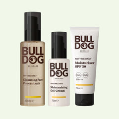 The Anytime Daily Collection Bundle features three Bulldog Skincare products: Cleansing Face Concentrate (pump), Daily Face Moisturiser SPF 30 (tube), and Gel-Cream, all with brown and white labels and natural origin ingredients.
